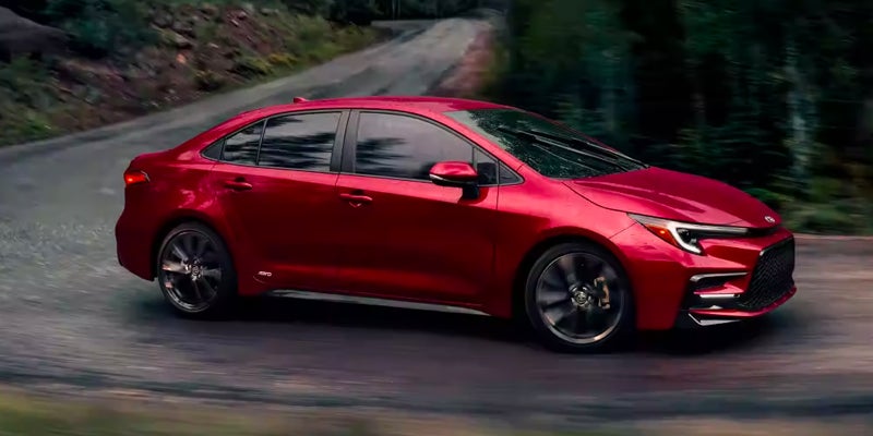 A 2024 Toyota Corolla driving near Kent, OH