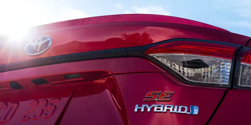 A 2024 Toyota Corolla Hybrid's trunk showing off the hybrid emblem near Kent, OH