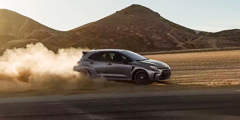 A 2024 Toyota GR Corolla kicking up dust as it off roads in Kent, OH