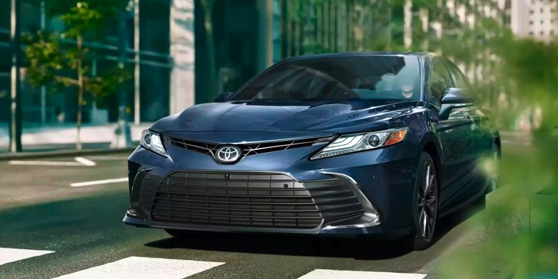 A 2024 Toyota Camry that is emerging on a city street in Kent, OH