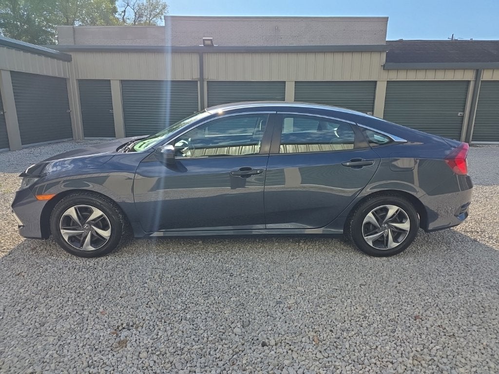 Used 2020 Honda Civic LX with VIN 2HGFC2F60LH541947 for sale in Kent, OH